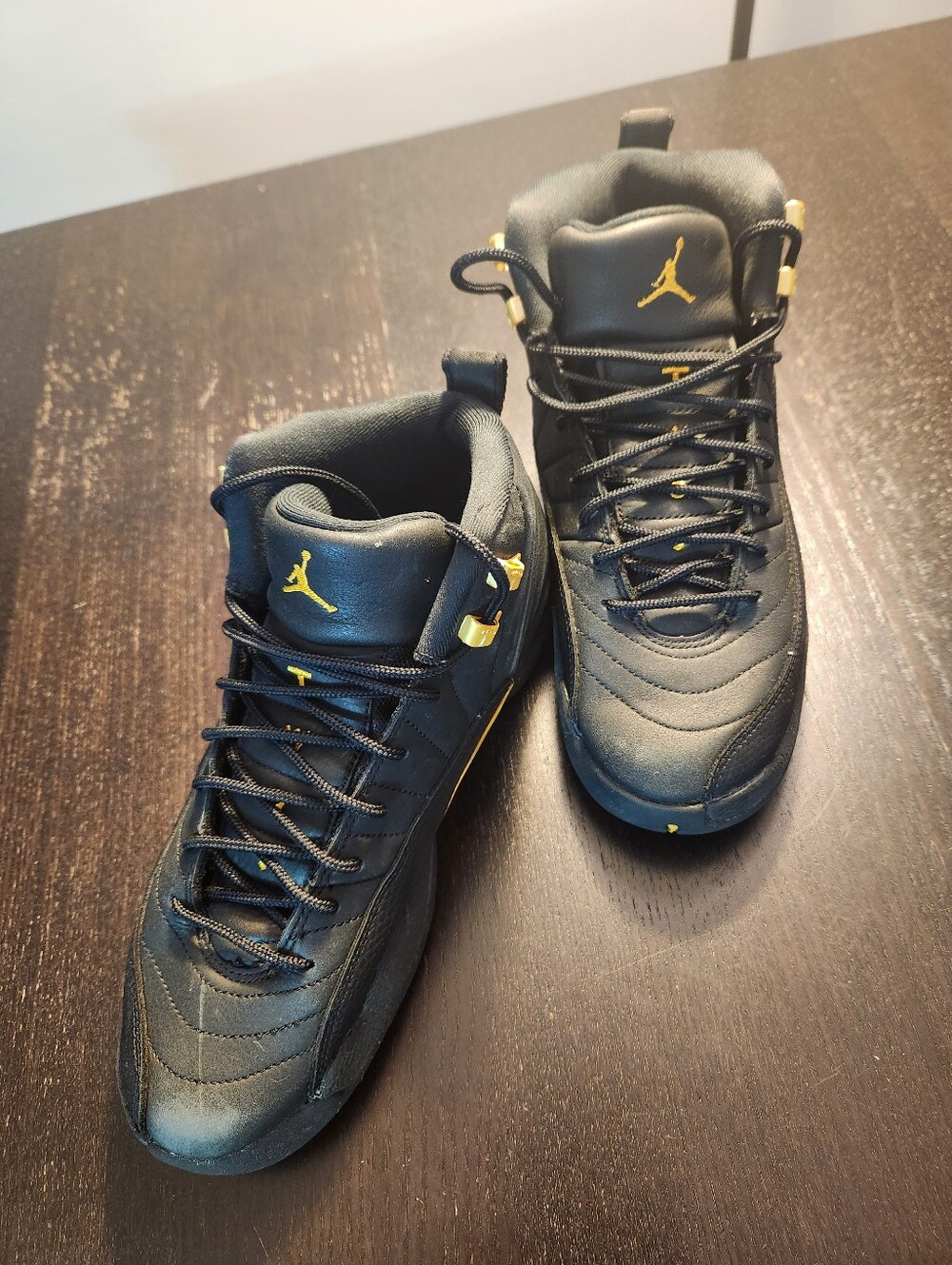 Jordan 13 Black and Gold High-Top Athletic Basketball Shoes.  See Pictures